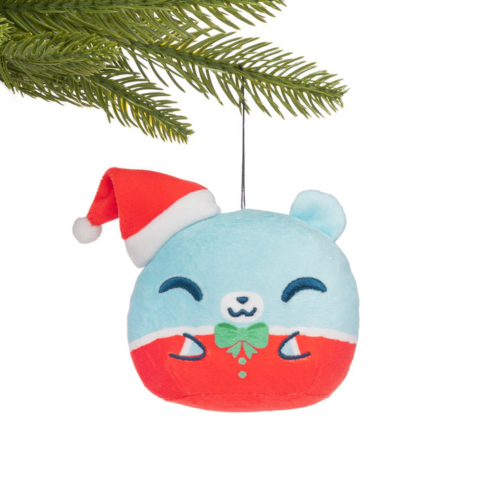 Santa Bear Plushie Ornament hanging from a branch