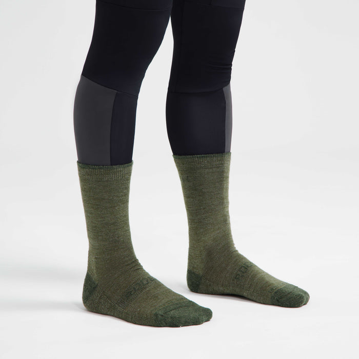 Rogelli Merino Wol fietssokken winter groen gedragen.