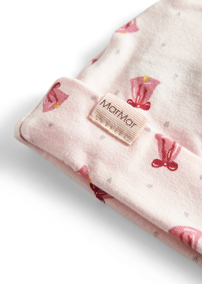 Cream-colored hat with red Christmas bells for newborn