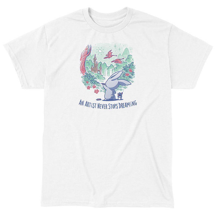 Classic Cotton T-shirt_TeeTurtle white An Artist Never Stops Dreaming apparel  featuring a bunny drawing a whimsical landscape with a castle, trees, and flying dragons. Caption reads, "an artist never stops dreaming".