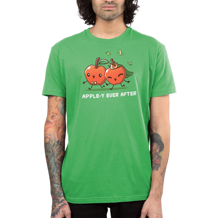 Premium Cotton T-shirt_TeeTurtle Apple-y Ever After apple t-shirt featuring two animated apples with happy faces holding hands, one wearing a bow tie and the other a crown and veil. The text "APPLE-Y EVER AFTER" is displayed below.