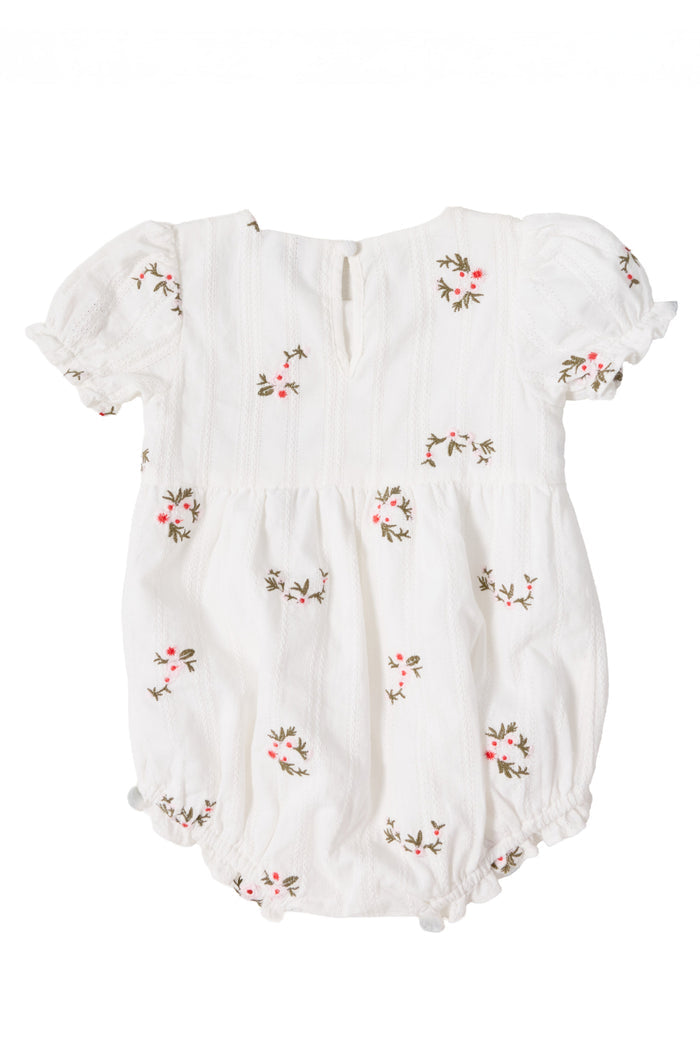 The Ivy City Co Baby Jessie Romper in Ditsy Embroidery features short puff sleeves, a smocked bodice, and pink and green floral embroidery on soft, lightweight striped cotton with elastic leg openings.