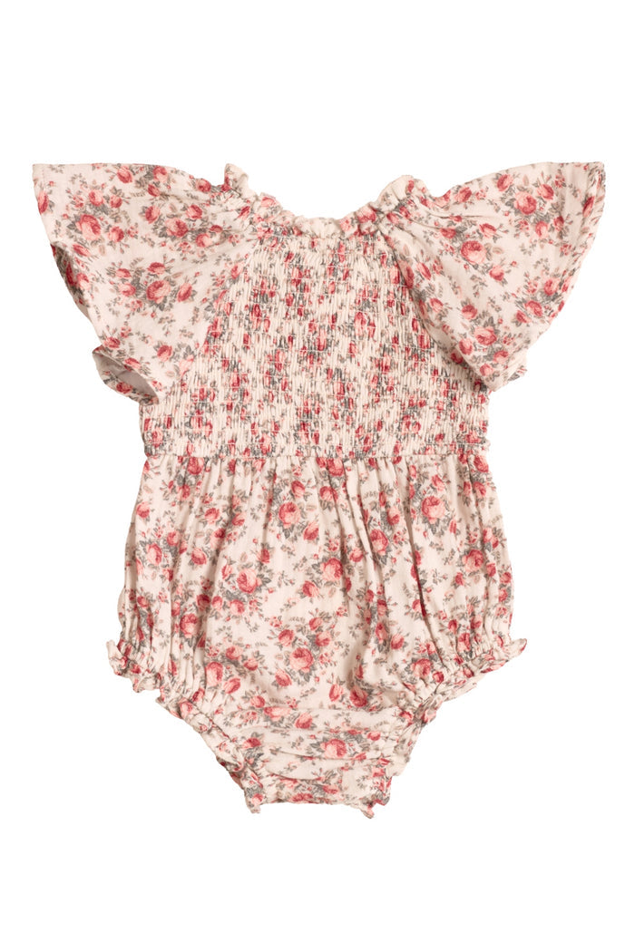 The Ivy City Co Baby Jovie Romper in Ivory Heritage Rose features short ruffled sleeves, a shirred bodice, pink and red roses on ivory, and elastic leg openings—ideal for adorable Mom and Me matching moments.