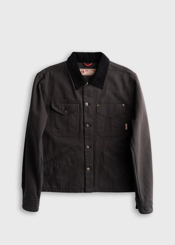 Men’s peach bull denim jacket with corduroy collar and boxy fit, four front pockets and shank button closure, durable cotton workwear outerwear with classic utility design