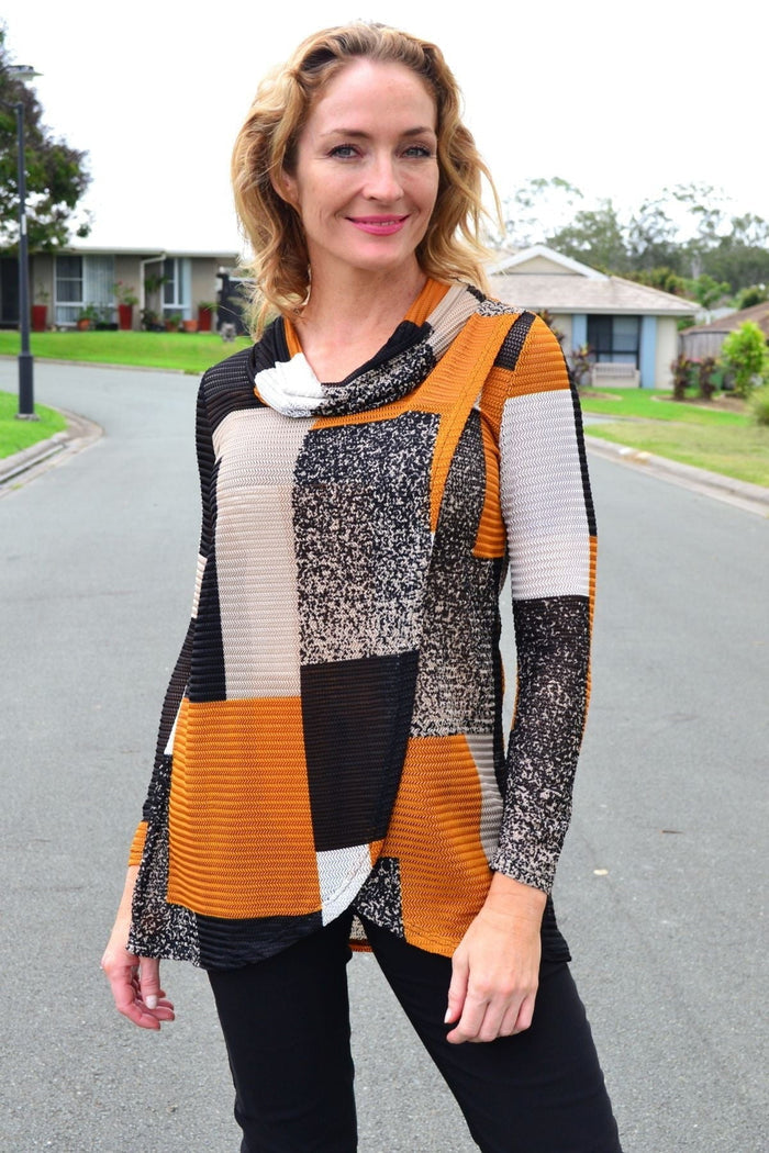Caramel-colored cowl neck tunic top by Caroline Morgan, featuring a cozy, draped neckline and relaxed fit, perfect for casual wear.