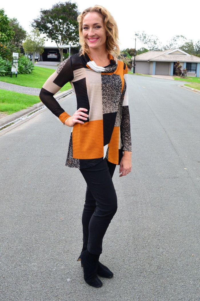 Caramel cowl neck tunic top by Caroline Morgan, shown on a hanger, featuring a soft fabric and relaxed fit design.