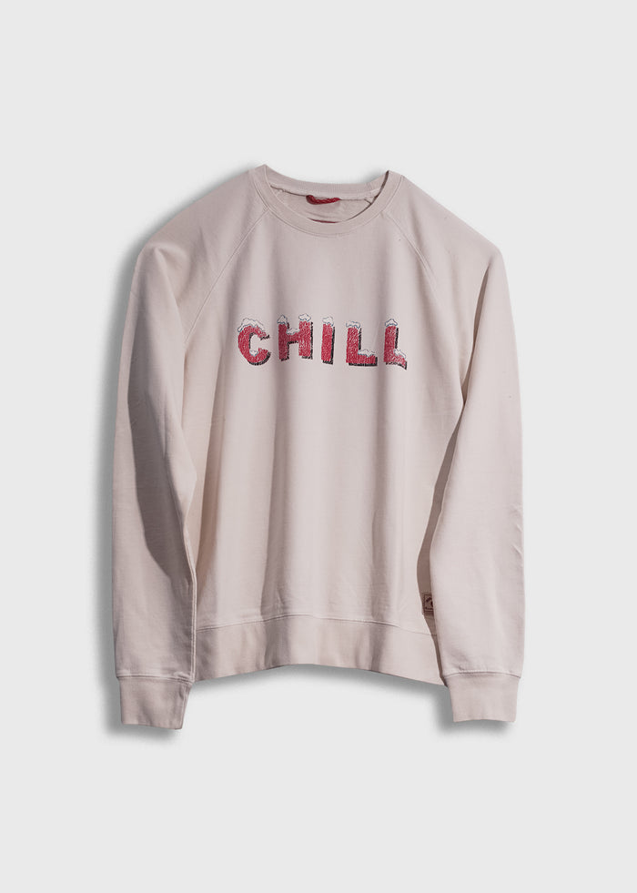 Cream sweatshirt with "CHILL" in red letters on front, displayed against a white background. Casual and relaxed style.