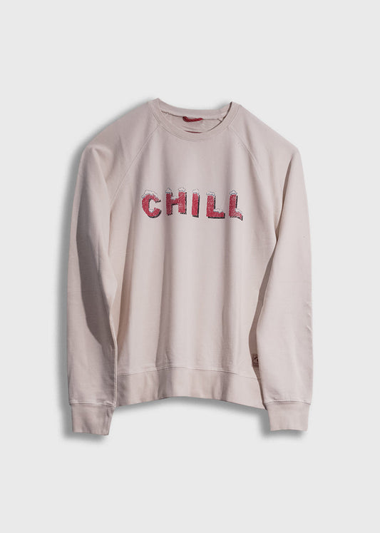 Cream sweatshirt with "CHILL" in red letters on front, displayed against a white background. Casual and relaxed style.