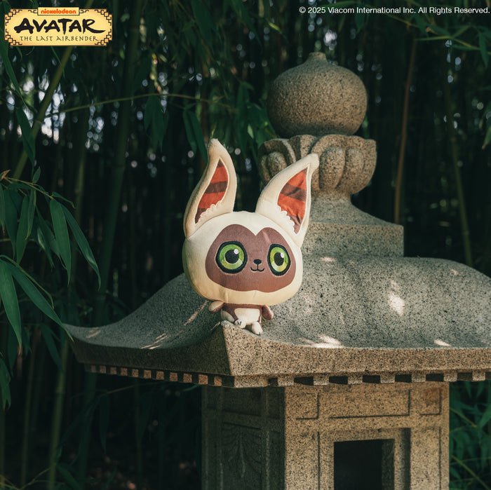 Cloudheads: 5" Momo sitting on top of a temple garden lantern