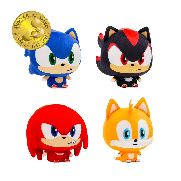 Four Sonic the Hedgehog Cloudheads - Sonic, Knuckles, Shadow, and Tails. They have big heads and tiny bodies and there is a Mom's Choice Awards badge in the upper left corner.