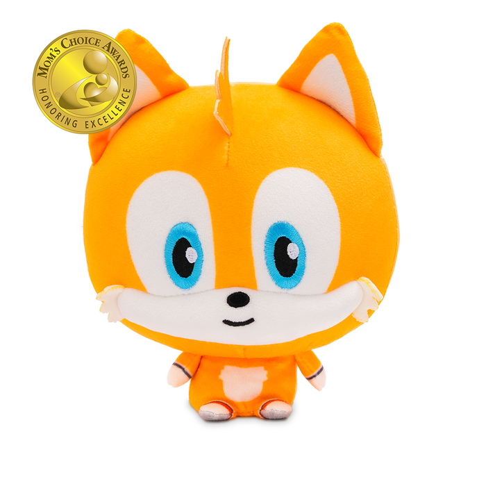 Tails Cloudhead, a plushie with a big head and a tiny body. He has a little smile on his face.