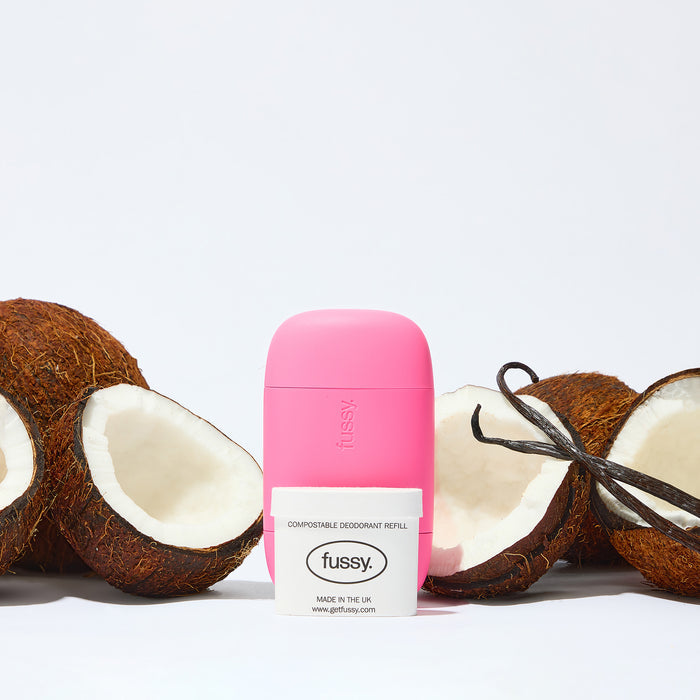 Fussy's natural, refillable deodorant starter pack in Coconut Milk scent (coconut, almond, vanilla) with deodorant case in Hot Pink colour.