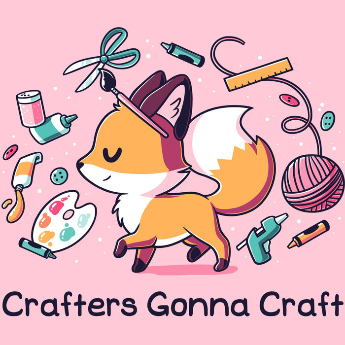 Premium Cotton T-shirt_TeeTurtle light pink Crafters Gonna Craft apparel featuring happy fox surrounded by crafting items such as paint, scissors, yarn, and glue. Caption below reads, "Crafters Gonna Craft".