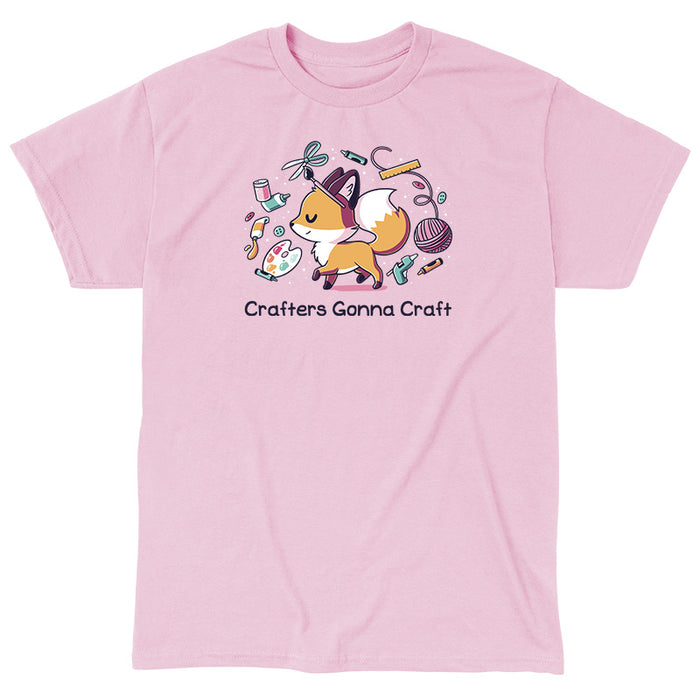 Classic Cotton T-shirt_TeeTurtle light pink Crafters Gonna Craft apparel featuring happy fox surrounded by crafting items such as paint, scissors, yarn, and glue. Caption below reads, "Crafters Gonna Craft".