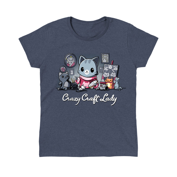 Classic Cotton T-shirt_TeeTurtle heather navy Crazy Craft Lady apparel featuring a cat happily sewing, surrounded by cat themed craft projects. Caption reads, "crazy craft lady".