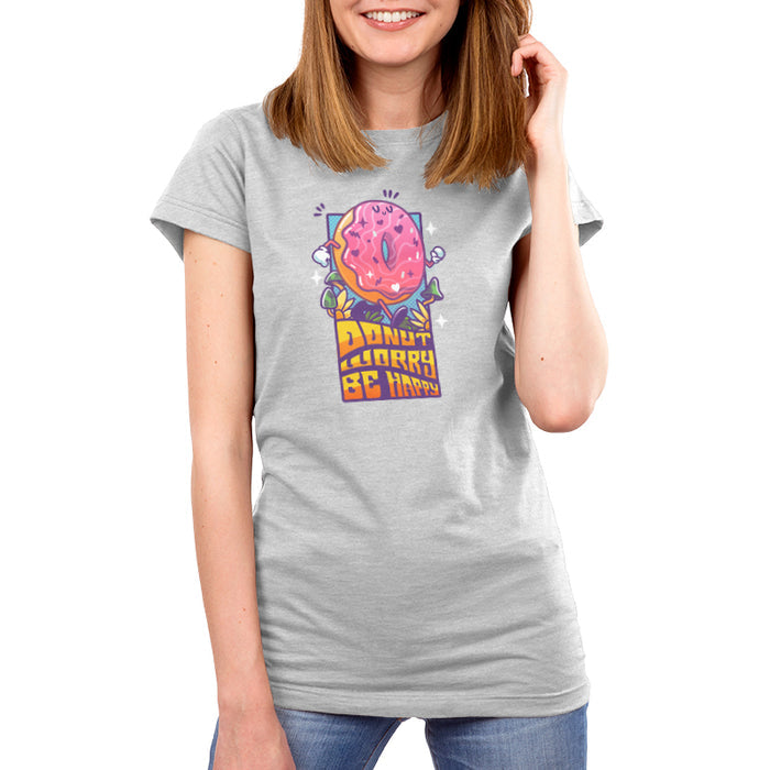 Premium Cotton T-shirt_TeeTurtle silver gray Donut Worry Be Happy apparel featuring a happy doughnut walking among grass and mushrooms with the caption, “Donut Worry Be Happy“ in an eighties, groovy, psychedelic font.