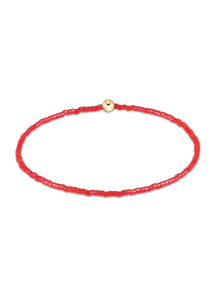 Red bead bracelet on a white background