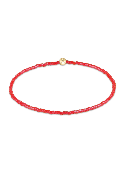 Red bead bracelet on a white background