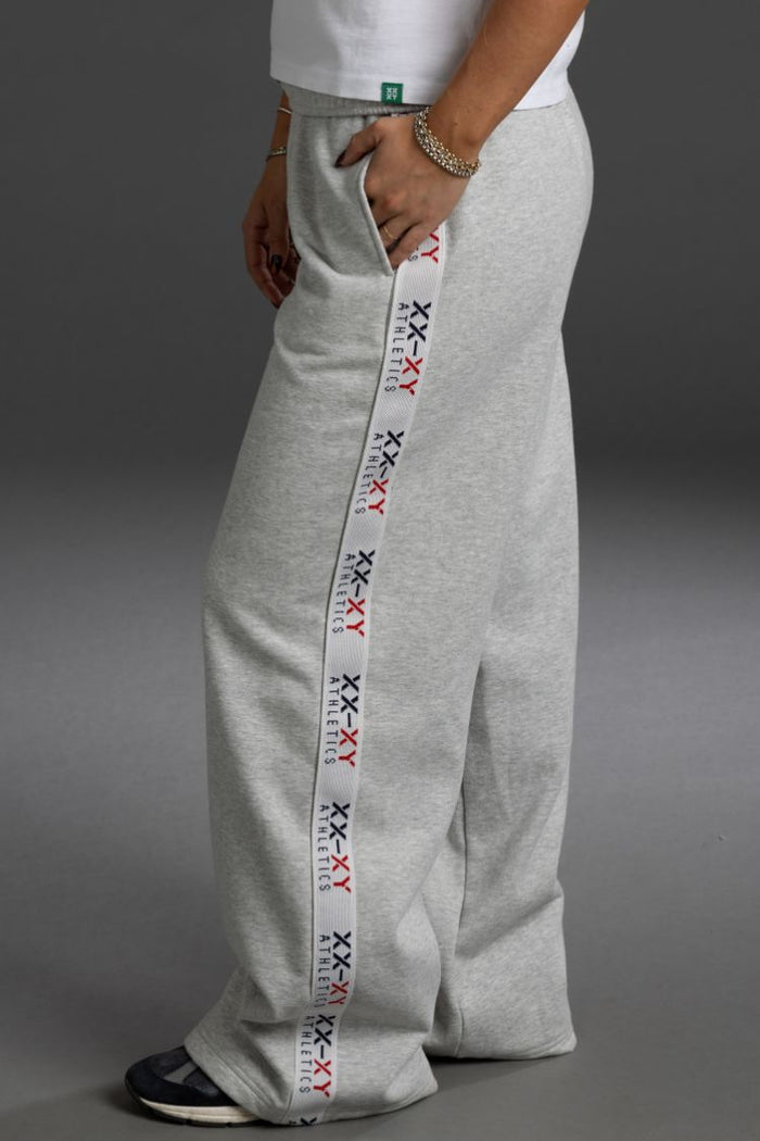Gray sweatpants with a colorful waistband on a gray background || Light Heather Gray