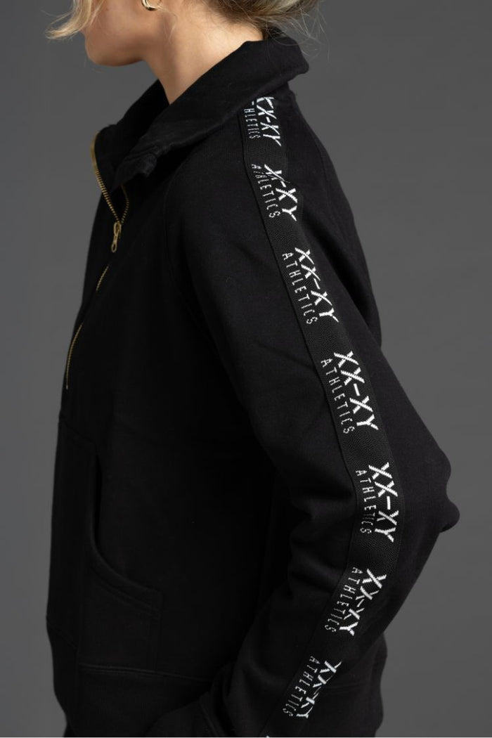 Black hoodie with white text on sleeves against a gray background || Black