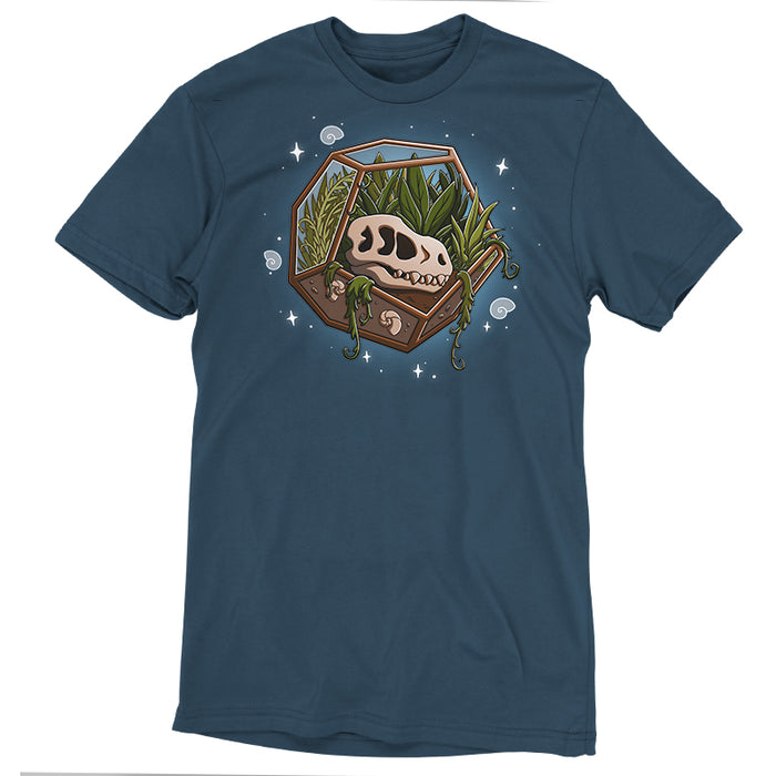 Premium Cotton T-shirt_TeeTurtle Flora Fossils denim blue t-shirt featuring an illustration of a skull in a hexagonal glass terrarium with various plants growing inside, surrounded by small stars and swirls.