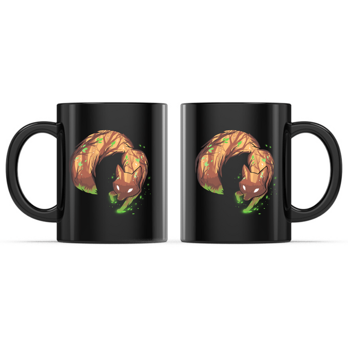 Ceramic Mug_TeeTurtle Forest Fox black mug featuring a curled-up woodland fox with glowing white eyes surrounded by green magical energy in a mystical forest design.
