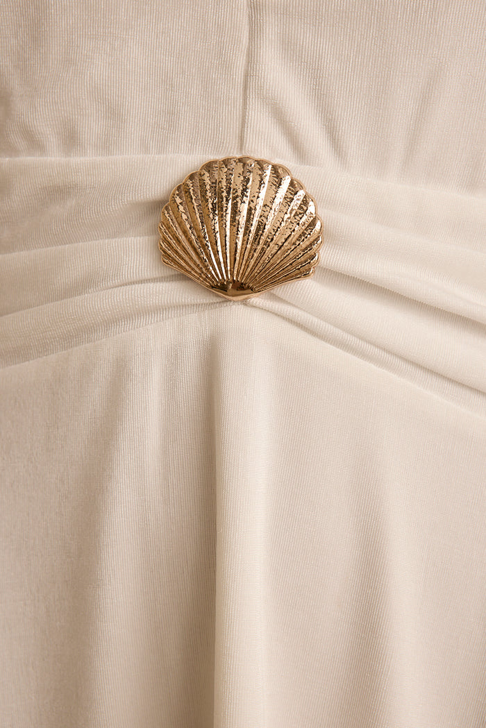 Gold seashell hardware anchoring the ruched waist of the Francesca white midi dress.