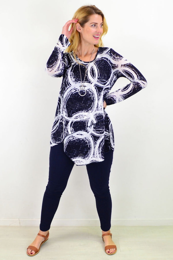 Blue swirl Galaxy Cross Over Swing Tunic Top by Caroline Morgan, shown on a model with a relaxed fit and flowing fabric.