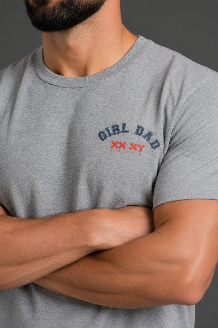 Person wearing a gray t-shirt with 'Girl Dad' text and graphics. || Light Heather Gray