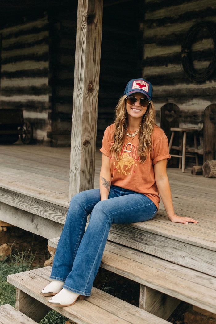 Cowboy rodeo graphic tee shirt. Fun bold colors. perfect for nights on the porch, out at the rodeo, or running around town