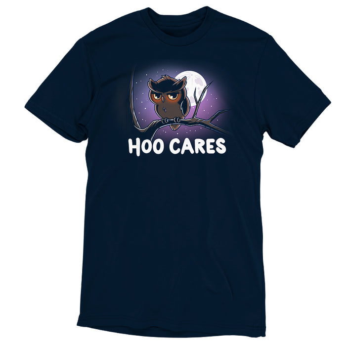 Premium Cotton T-shirt_TeeTurtle navy blue Hoo Cares apparel featuring an owl with a deadpan expression perched on a branch with a moonlit sky in the background with the caption, “Hoo Cares“.