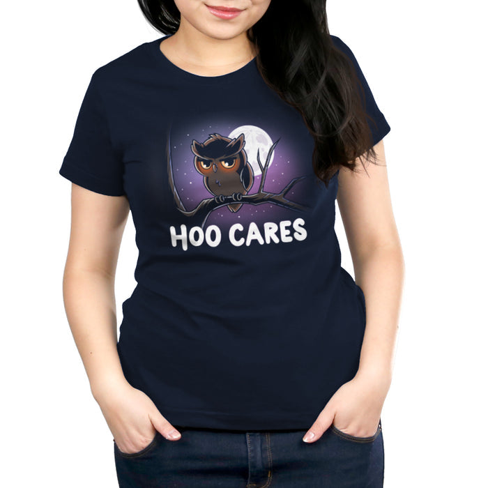 Premium Cotton T-shirt_TeeTurtle navy blue Hoo Cares apparel featuring an owl with a deadpan expression perched on a branch with a moonlit sky in the background with the caption, “Hoo Cares“.