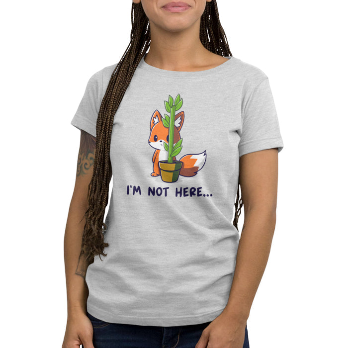 Premium Cotton T-shirt_TeeTurtle silver gray I'm Not Here featuring an anxious fox awkwardly trying to hide behind a thin potted plant with the words "I'm Not Here..." below.