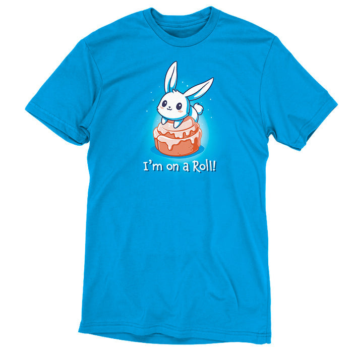 Premium Cotton T-shirt_TeeTurtle cobalt blue I'm On A Cinnamon Roll apparel featuring a cute cartoon bunny sitting on top of a glazed cinnamon roll with the text "I'm On a Roll!" written below.