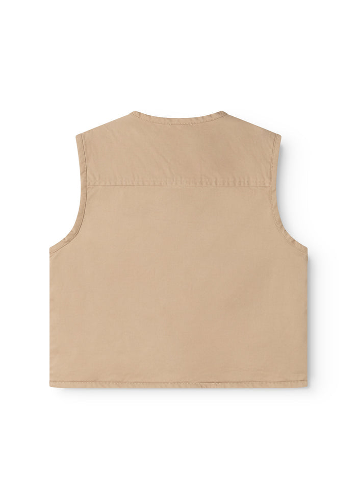 Sand-colored children's vest with simple back and smooth front.