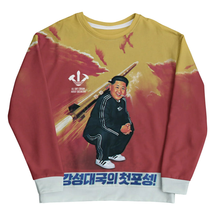 Satirizing propaganda through a streetwear lens, a stylized North Korean leader squats in a black athletic suit (complete with white triple-stripe piping) against a smoggy mustard gold and deep revolutionary crimson haze. Contact us with accessibility feedback, we'd love to help!