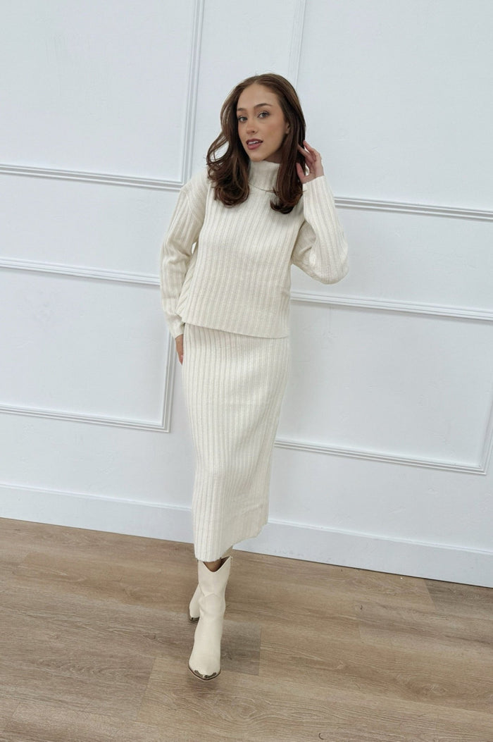 long sleeve ribbed turtle neck sweater that matches with skirt