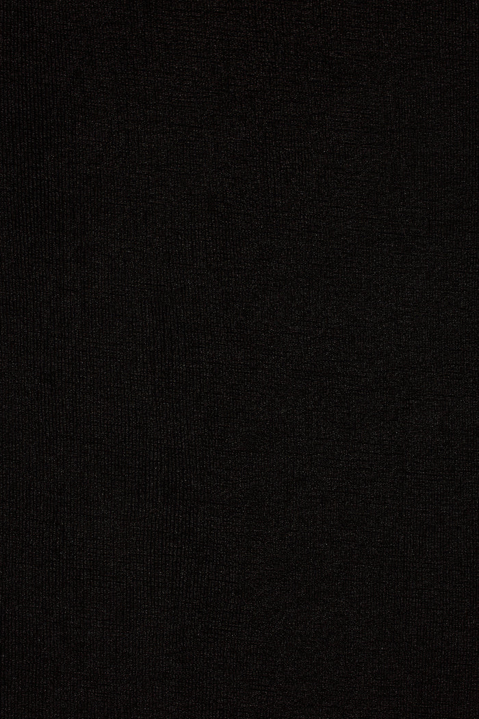 Close-up of black slinky stretch knit fabric used in the Melani midi dress.
