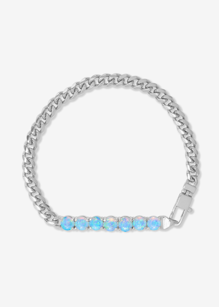 Silver chain bracelet with seven blue opal stones on a white background