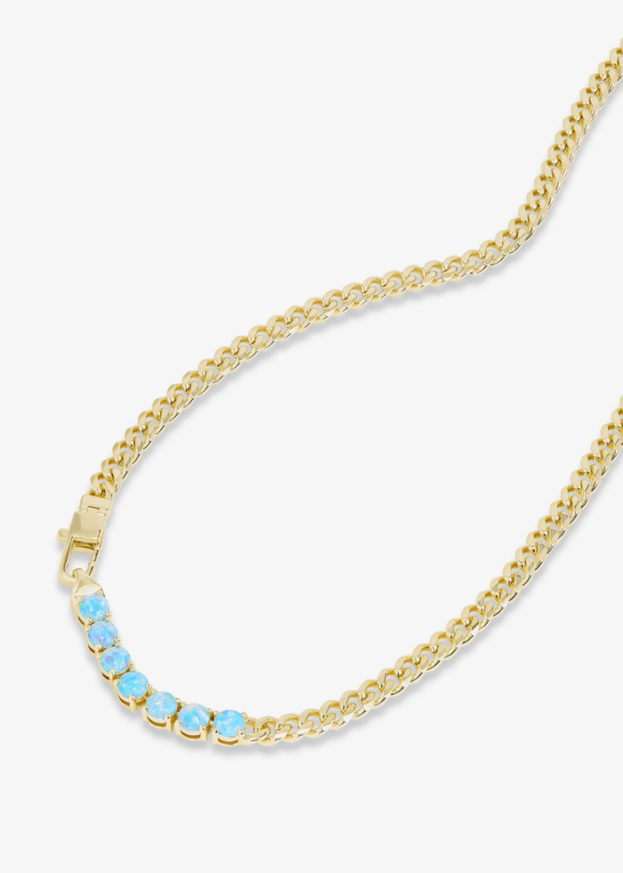 Gold chain necklace with seven blue opal stones