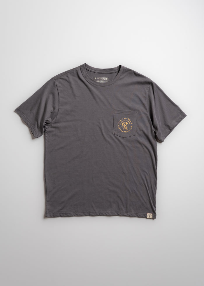 Gray T-shirt with a small pocket on the left chest, featuring a circular yellow logo. Simple design on a plain background.