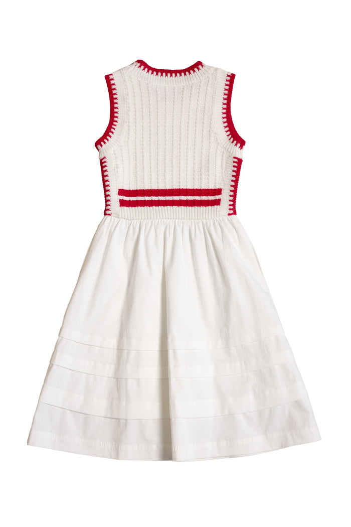 The Ivy City Co Mini Lisbon Dress in Ivory & Firework Red features a sleeveless, ribbed bodice with red trim and a flared, pleated skirt. Shown from the back—an ideal pick for festive Fourth of July celebrations.