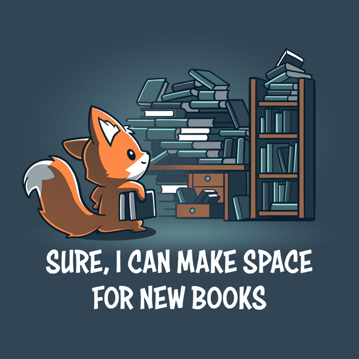 Premium Cotton T-shirt_TeeTurtle denim blue Never-Ending Bookshelf apparel featuring a fox holding a book standing in front of an overflowing book and desk with the caption, “Sure, I can Make Space for New Books“.