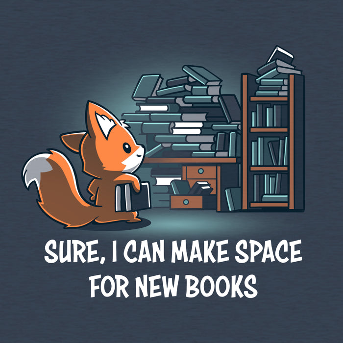 Classic Cotton T-shirt_TeeTurtle heather navy Never-Ending Bookshelf apparel featuring a fox holding a book standing in front of an overflowing book and desk with the caption, “Sure, I can Make Space for New Books“.