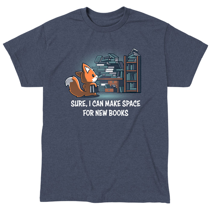 Classic Cotton T-shirt_TeeTurtle heather navy Never-Ending Bookshelf apparel featuring a fox holding a book standing in front of an overflowing book and desk with the caption, “Sure, I can Make Space for New Books“.