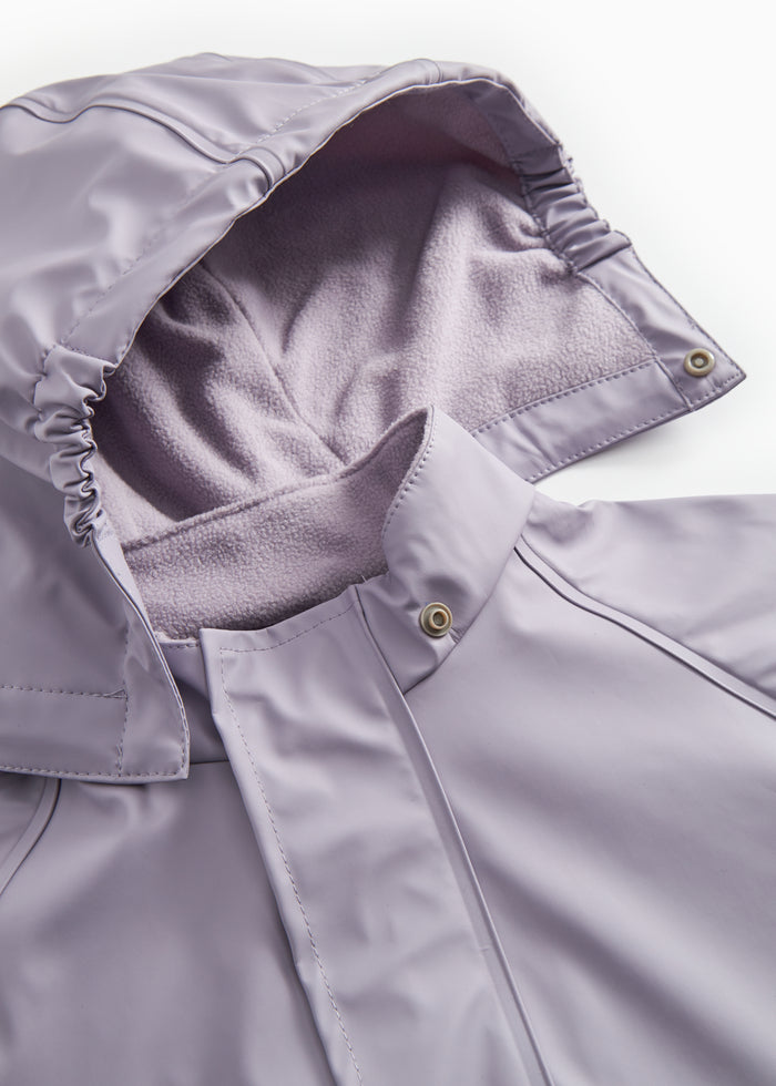 Lavender raincoat: inner hood lining and pressure buttons at seam