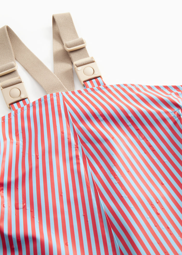 Set of stripes with red and blue stripes, beige waist straps, and a hood.