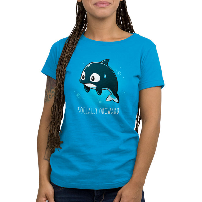 Premium Cotton T-shirt_TeeTurtle cobalt blue Orcward apparel featuring an orca with a nervous expression, a sweat drop on its head, and the text "SOCIALLY ORCWARD" below it.