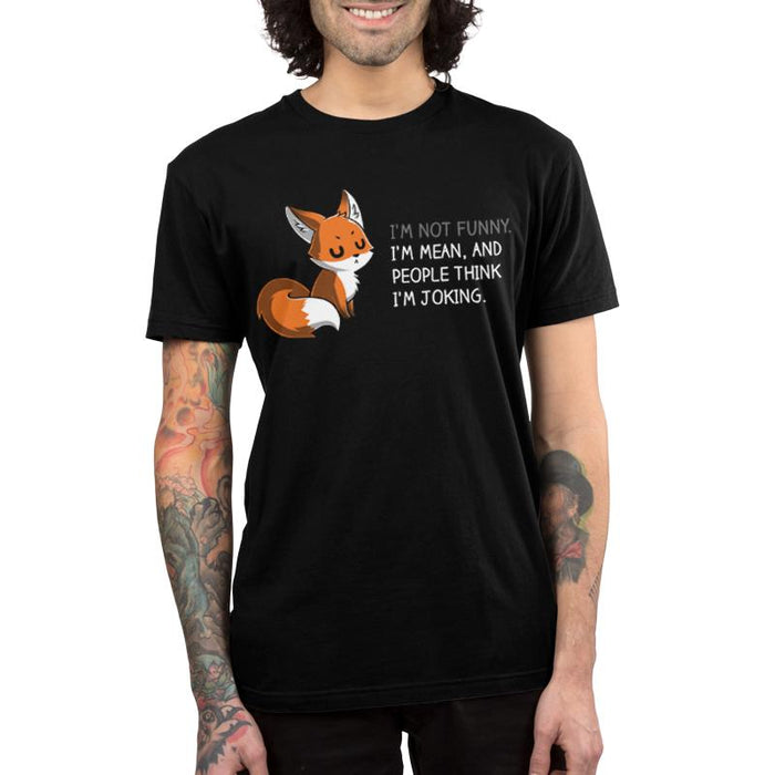 Premium Cotton T-shirt_TeeTurtle black People Think I'm Joking featuring an irritated fox with its eyes closed explaining how its not funny, just mean with words "I'm Not Funny. I'm Mean, and People Think I'm Joking.".