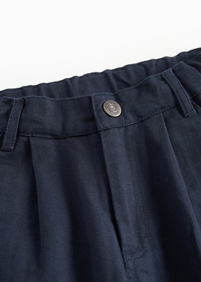 Dark blue party pants with button closure and pockets for children